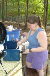 <img0*300:stuff/z/26733/Kaleigh%2527s%2520photos%2520-%2520camping/Shana%20cooking.jpg>